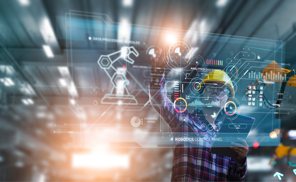 中空に浮いている半透明の画面を操作する、工場スタッフの様子（イメージ）